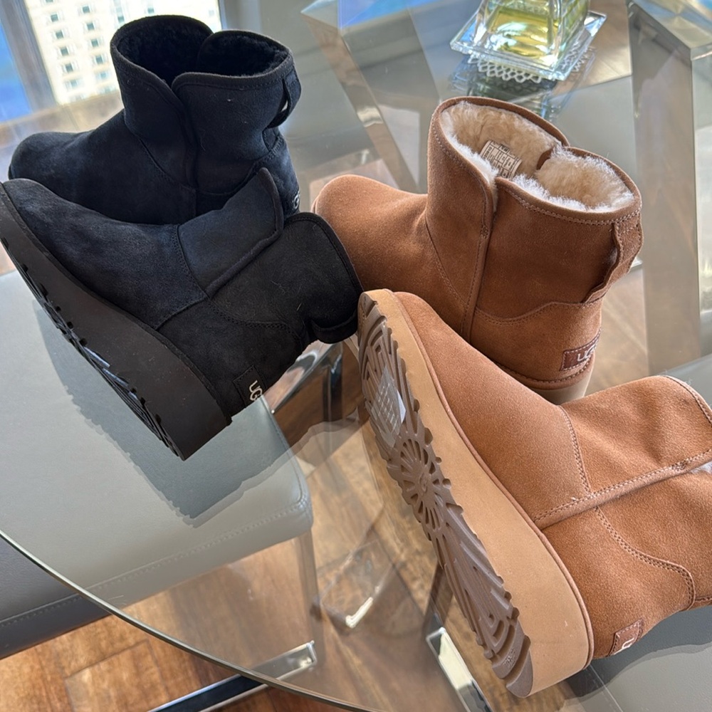 get 2 pairs for 1 
New without boxes size 7 women,UGG camel/black color